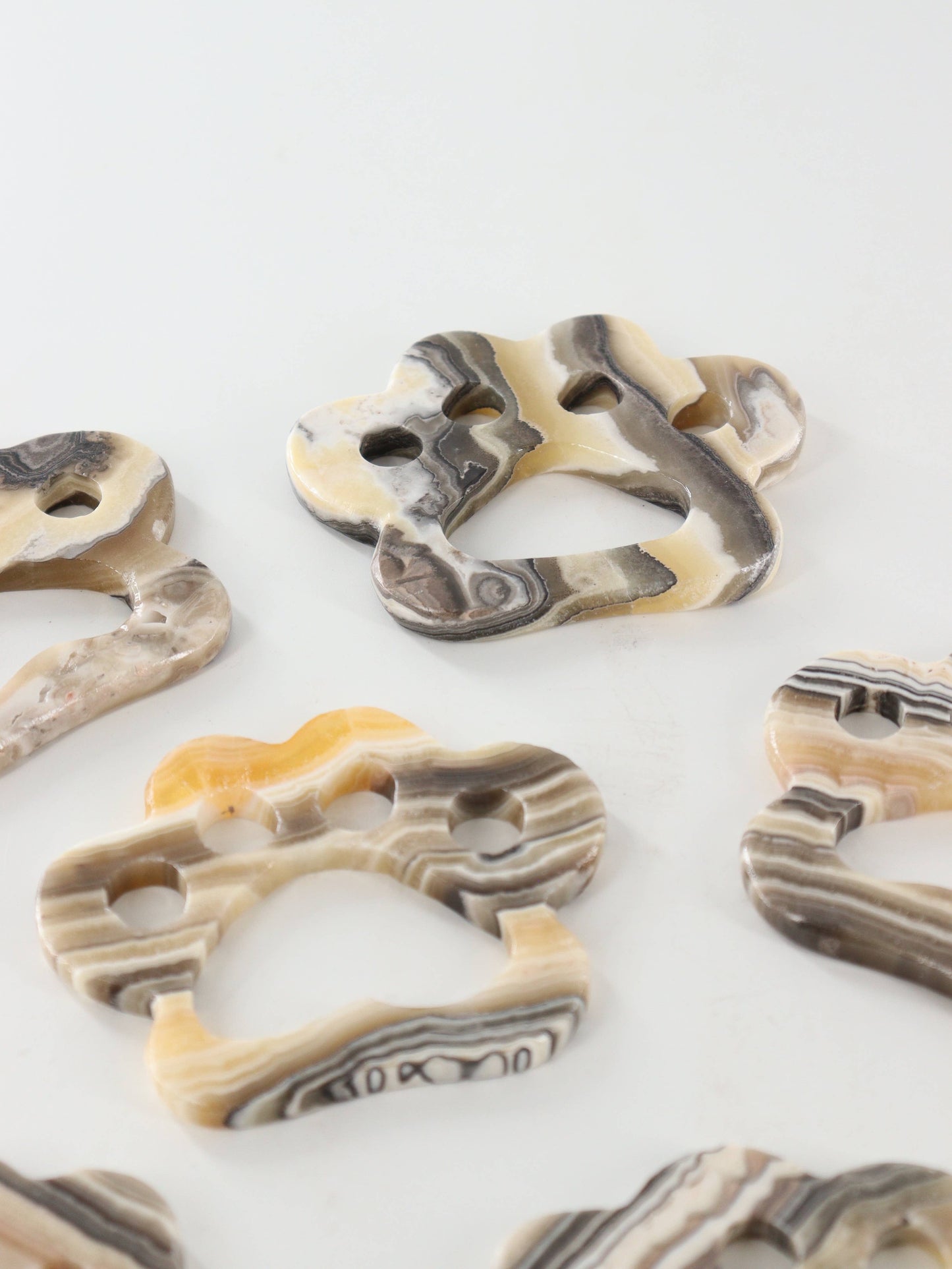 Yellow Zebra Onyx Paw Carvings